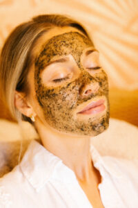 exfoliating paste on peaceful woman